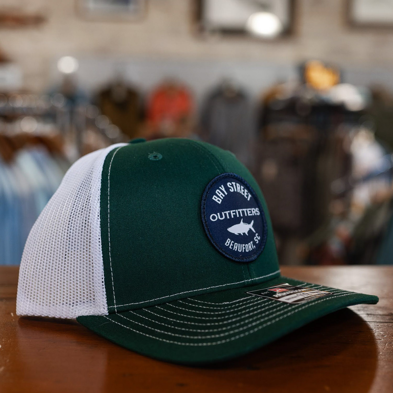 Split Dark Green and White Tarpon Patch Trucker Hat
